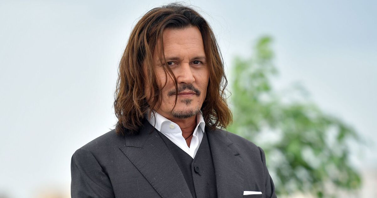 Johnny Depp looks unrecognisable with new grey hair cut and blue eyes