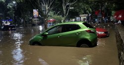 Horror floods in Kenya kill at least 62 people as two children saved from flooded home